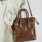 Maelora | Glossy Black Leather Drawstring Bag – Chic & Modern - in Cream | Arvea Bags