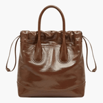 Maelora | Glossy Black Leather Drawstring Bag – Chic & Modern - in Dark Brown | Arvea Bags