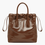 Maelora | Glossy Black Leather Drawstring Bag – Chic & Modern - in Dark Brown | Arvea Bags