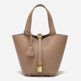 Minimalist Leather Bucket Bag – Small Structured Tote with Gold Padlock Detail - in Taupe | Arvea Bags