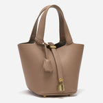Minimalist Leather Bucket Bag – Small Structured Tote with Gold Padlock Detail - in Taupe | Arvea Bags