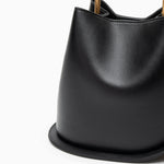 Modern Sculptural Leather Handbag – Minimalist Design with Gold Handle - in Black | Arvea Bags