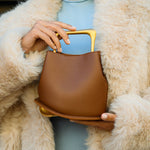 Modern Sculptural Leather Handbag – Minimalist Design with Gold Handle - in Caramel | Arvea Bags