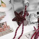 Nivelle | Leopard Star Leather Bag Charm – Bold, Stylish & Unique - in Maroon | Arvea Bags
