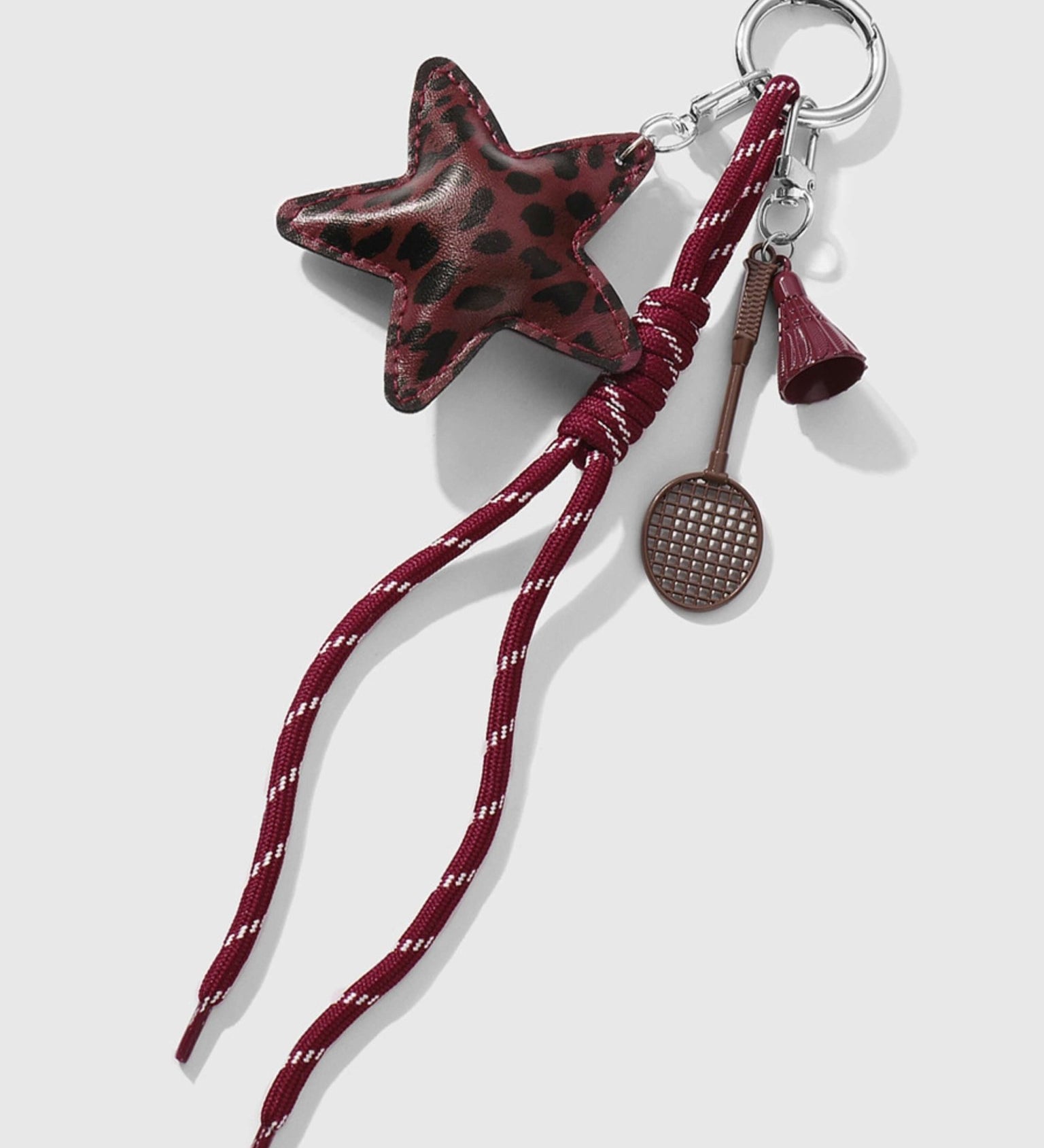 Nivelle | Leopard Star Leather Bag Charm – Bold, Stylish & Unique - in Maroon | Arvea Bags