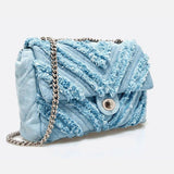 Nova Denim Chevron Crossbody – Frayed Jean Shoulder Bag with Chain Strap - in Denim Blue | Arvea Bags