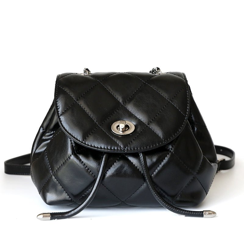 Perseis | Silver Quilted Leather Backpack – Chic, Trendy & Eye - Catching - in Black | Arvea Bags