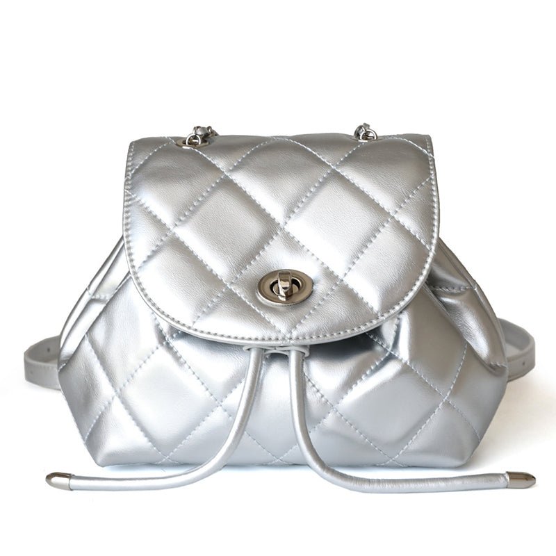Perseis | Silver Quilted Leather Backpack – Chic, Trendy & Eye - Catching - in Silver | Arvea Bags