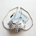 Perseis | Silver Quilted Leather Backpack – Chic, Trendy & Eye - Catching - in Silver | Arvea Bags