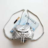 Perseis | Silver Quilted Leather Backpack – Chic, Trendy & Eye - Catching - in Silver | Arvea Bags