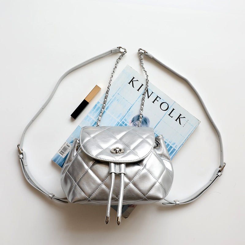 Perseis | Silver Quilted Leather Backpack – Chic, Trendy & Eye - Catching - in Silver | Arvea Bags