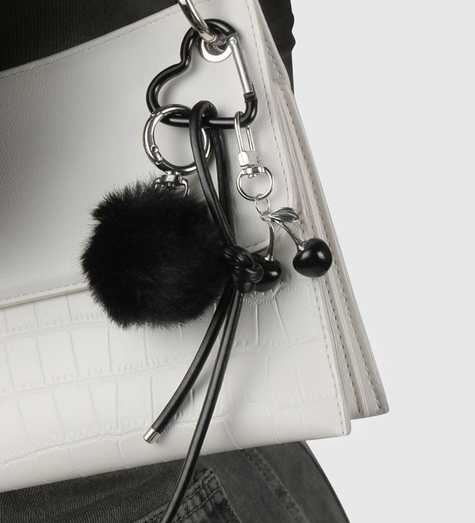Praelia | Black Pom - Pom Heart Charm – Chic, Modern & Playful - in Black | Arvea Bags