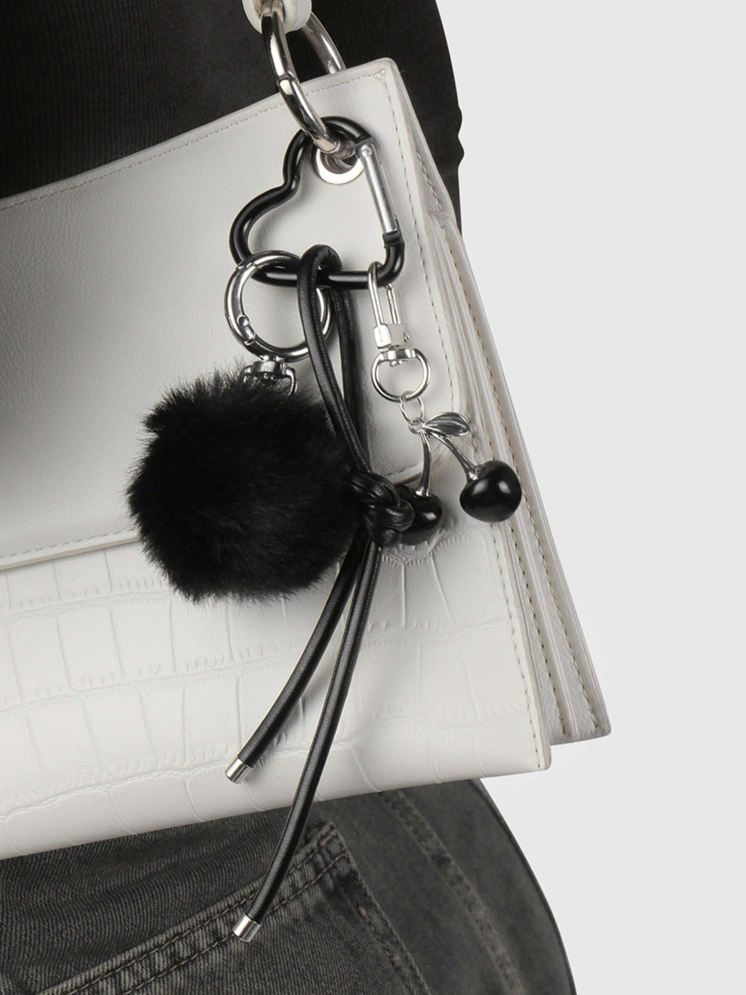 Praelia | Black Pom - Pom Heart Charm – Chic, Modern & Playful - in Black | Arvea Bags
