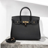 Premium Real Leather Work Bag – Structured Black Handbag with Gold Lock & Strap - in Black | Arvea Bags