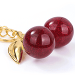 Ruby | Glitter Cherry Gold Keychain – Sparkling Elegance - in Bordeaux red | Arvea Bags