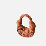 Saphira | Bold Red Sculptural Leather Handbag – Unique, Artistic & Statement - Making - in Brown | Arvea Bags