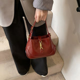 Sofie Saddle Bag – Glossy Burgundy Vegan Leather Shoulder Bag - in Red | Arvea Bags