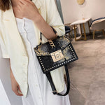 Statement Messenger Bag with Chain Detail and Python Texture - in Black | Arvea Bags