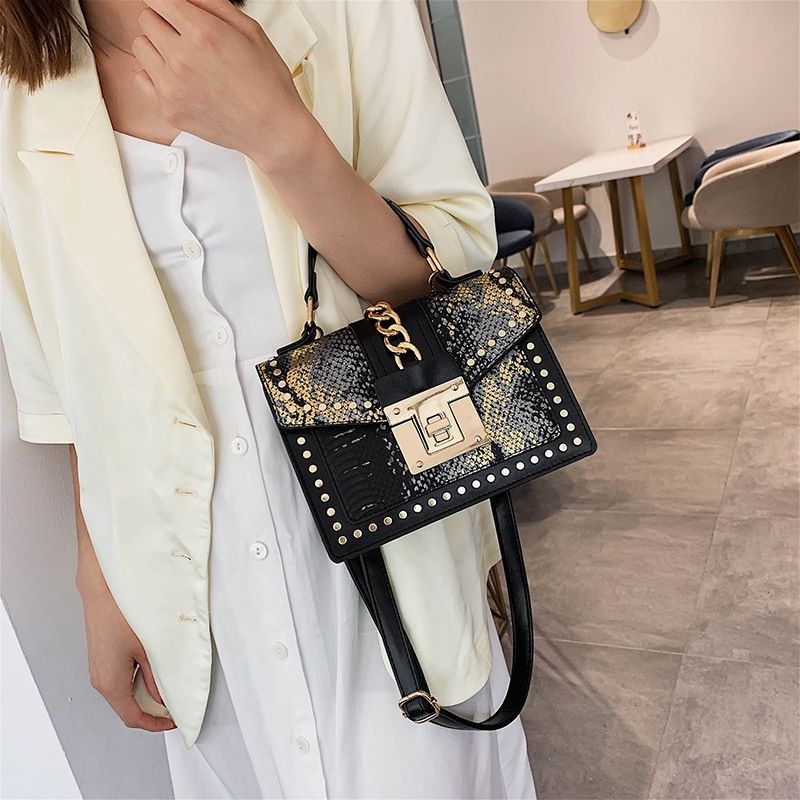 Statement Messenger Bag with Chain Detail and Python Texture - in Black | Arvea Bags
