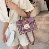 Statement Messenger Bag with Chain Detail and Python Texture - in Salmon Pink | Arvea Bags