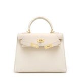 Timeless Trapeze Satchel – Compact Luxury Bag with Top Handle & Lock - in Light Beige | Arvea Bags