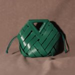 Unique Woven Leather Crossbody Bag – Distinctive Triangle Handle & Bucket Style - in Black | Arvea Bags