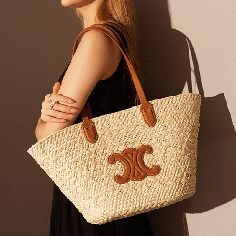 Women's Vintage Straw Woven Tote Bag with Leather Handles and Decorative Emblem - in Apricot | Arvea Bags