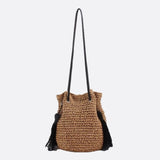 Woven Drawstring Bucket Bag with Tassels - in Light Brown | Arvea Bags