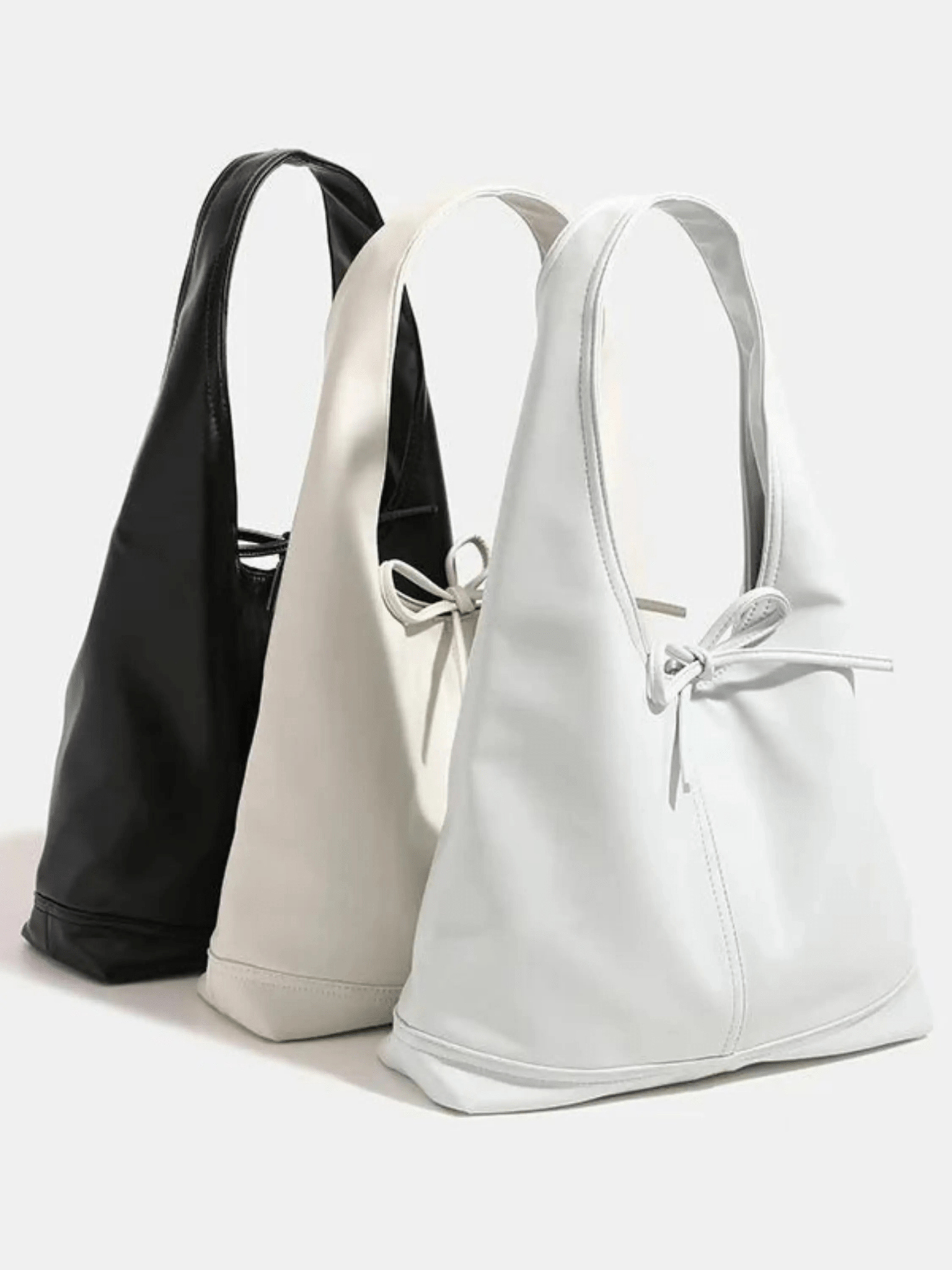 Zarevia | Luxe White Leather Knot Bag – Minimal & Elegant - in Black | Arvea Bags